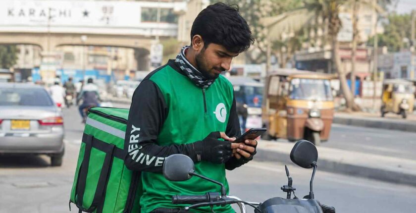 Food delivery rider jobs in Karachi - rider with motorcycle and delivery bag